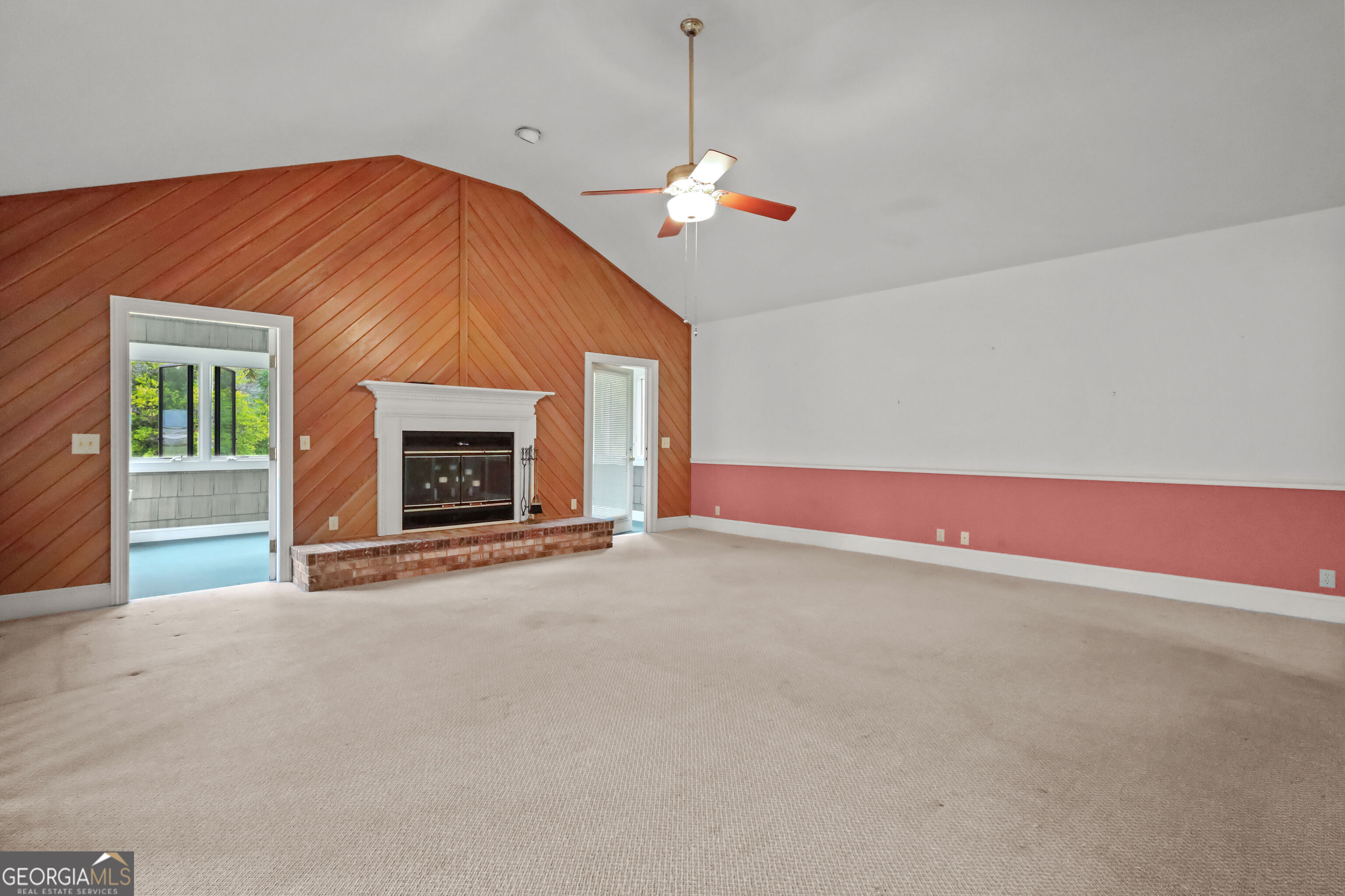 103 Cartwright Circle Brunswick, GA 31525 - Photo 16 of 54 a view of empty room with fireplace and window