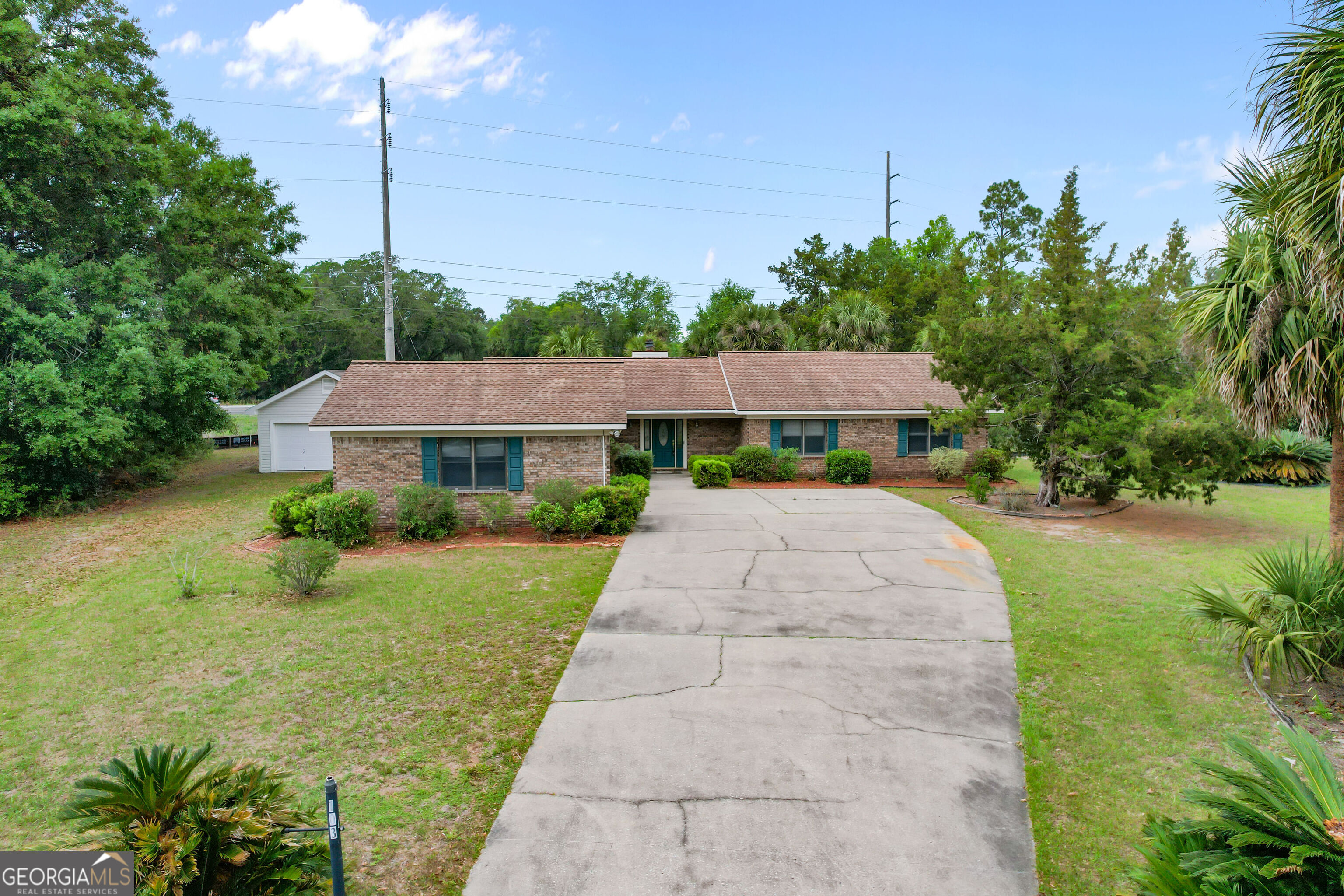 103 Cartwright Circle Brunswick, GA 31525 - Photo 39 of 54 a view of a house with garden