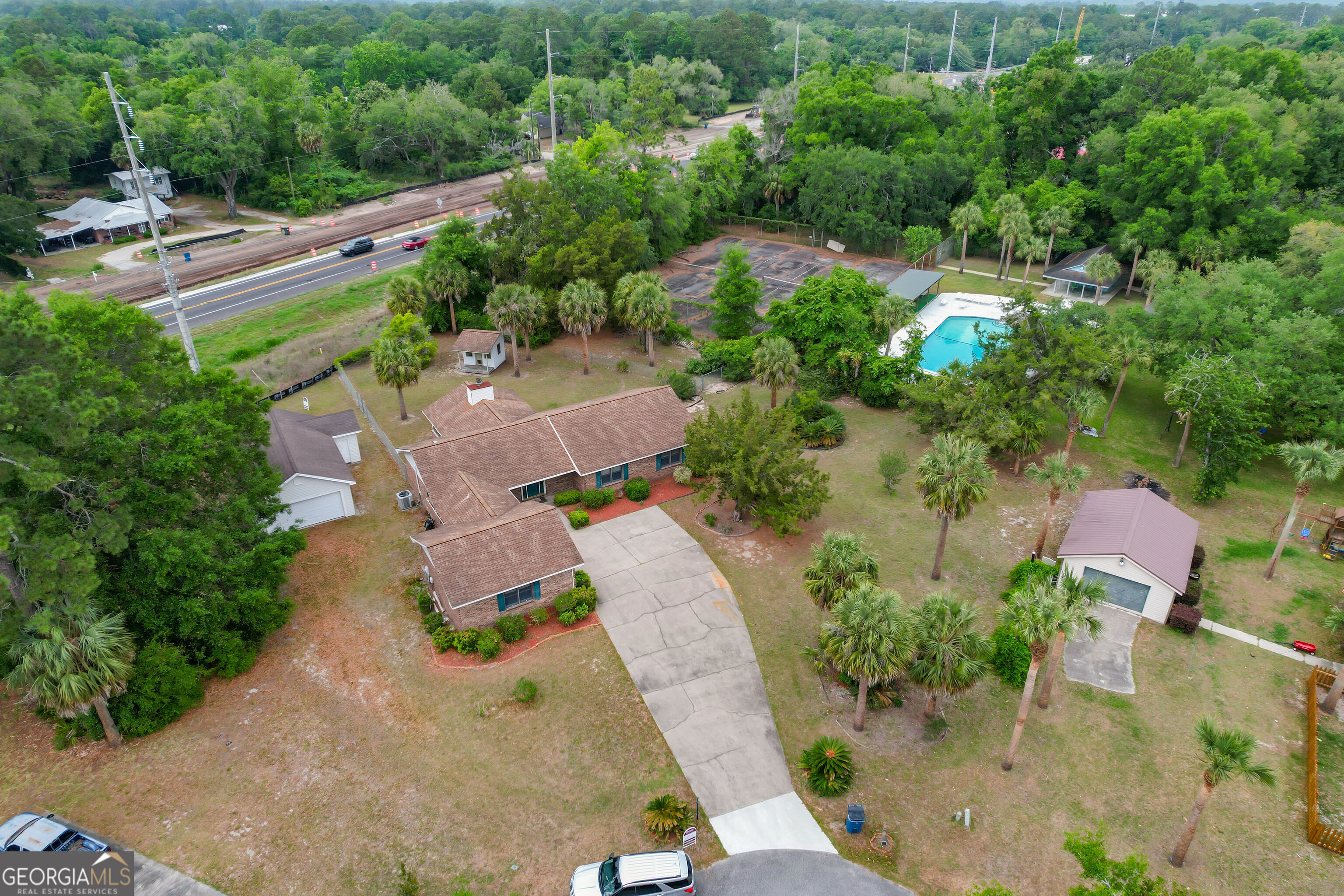 103 Cartwright Circle Brunswick, GA 31525 - Photo 40 of 54 an aerial view of a house with a yard