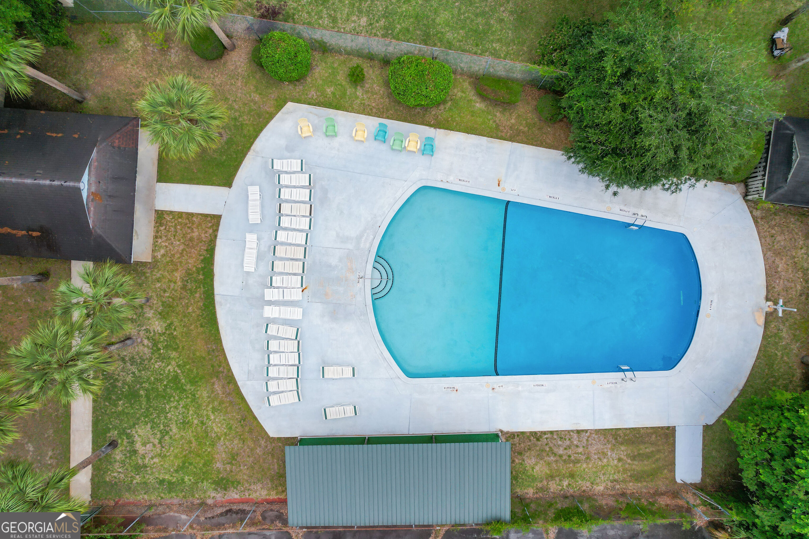 103 Cartwright Circle Brunswick, GA 31525 - Photo 44 of 54 an aerial view of a house with a swimming pool