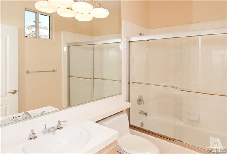 3909 Timberridge Road Moorpark, CA 93021 - Photo 14 of 22 a bathroom with a bathtub and a shower
