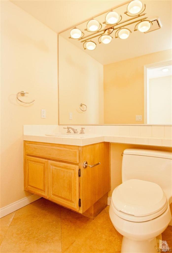 3909 Timberridge Road Moorpark, CA 93021 - Photo 3 of 22 a bathroom with a sink a toilet and shower