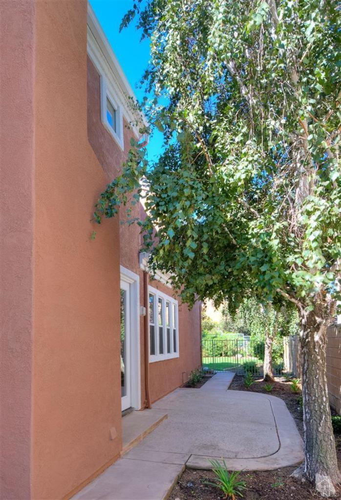 3909 Timberridge Road Moorpark, CA 93021 - Photo 22 of 22 a front view of a house with yard and trees