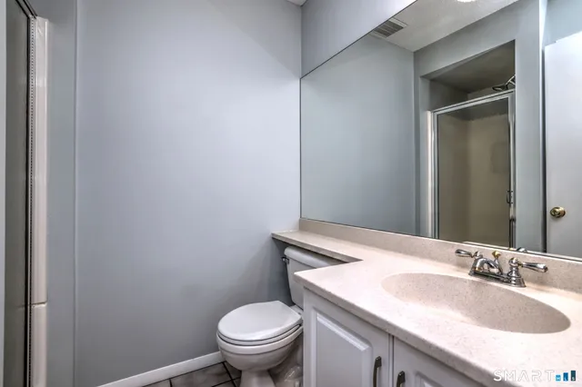 a bathroom with a sink and a toilet