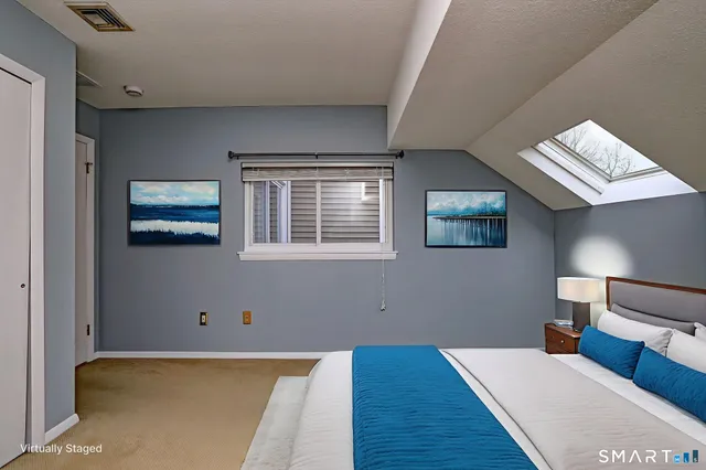 a view of a livingroom with furniture and wooden floor