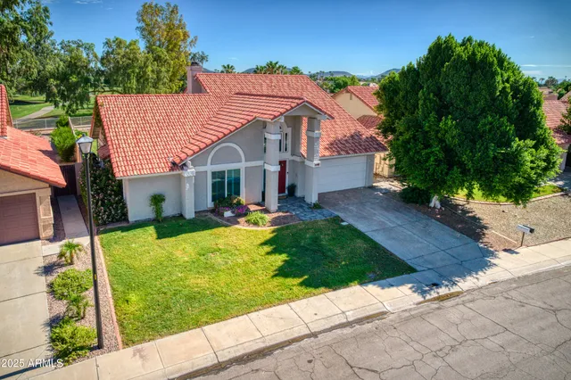 a view of a house with garden