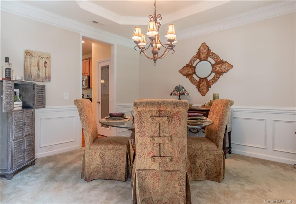 319 Lorraine Road Fort Mill, SC 29708 - Photo 8 of 32 a dining room filled with furniture and chandelier