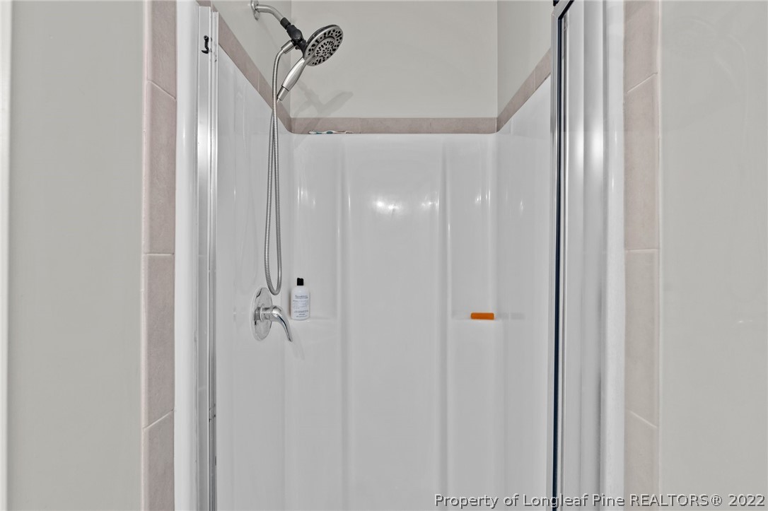 699 Cape Fear Road Raeford, NC 28376 - Photo 19 of 35 a bathroom with a shower