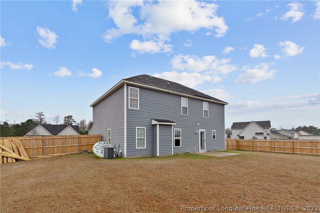 699 Cape Fear Road Raeford, NC 28376 - Photo 24 of 35 a view of a house with a backyard