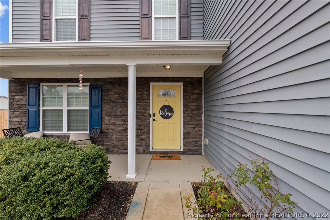 699 Cape Fear Road Raeford, NC 28376 - Photo 29 of 35 a front view of a house with a garden