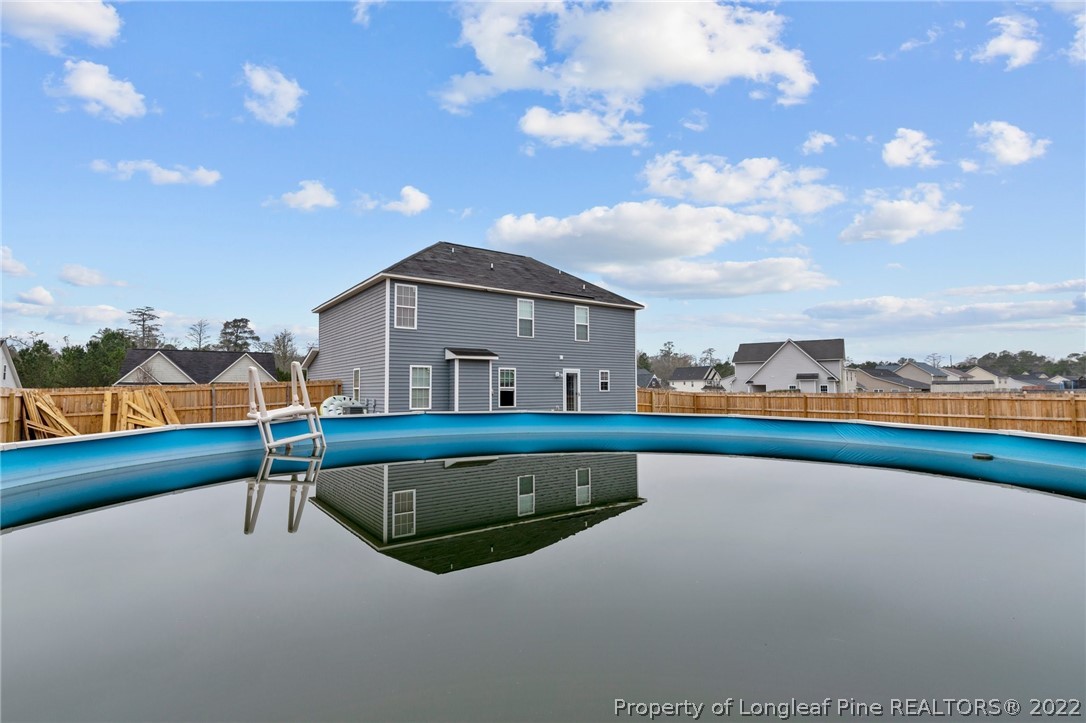 699 Cape Fear Road Raeford, NC 28376 - Photo 33 of 35 a view of swimming pool with a terrace