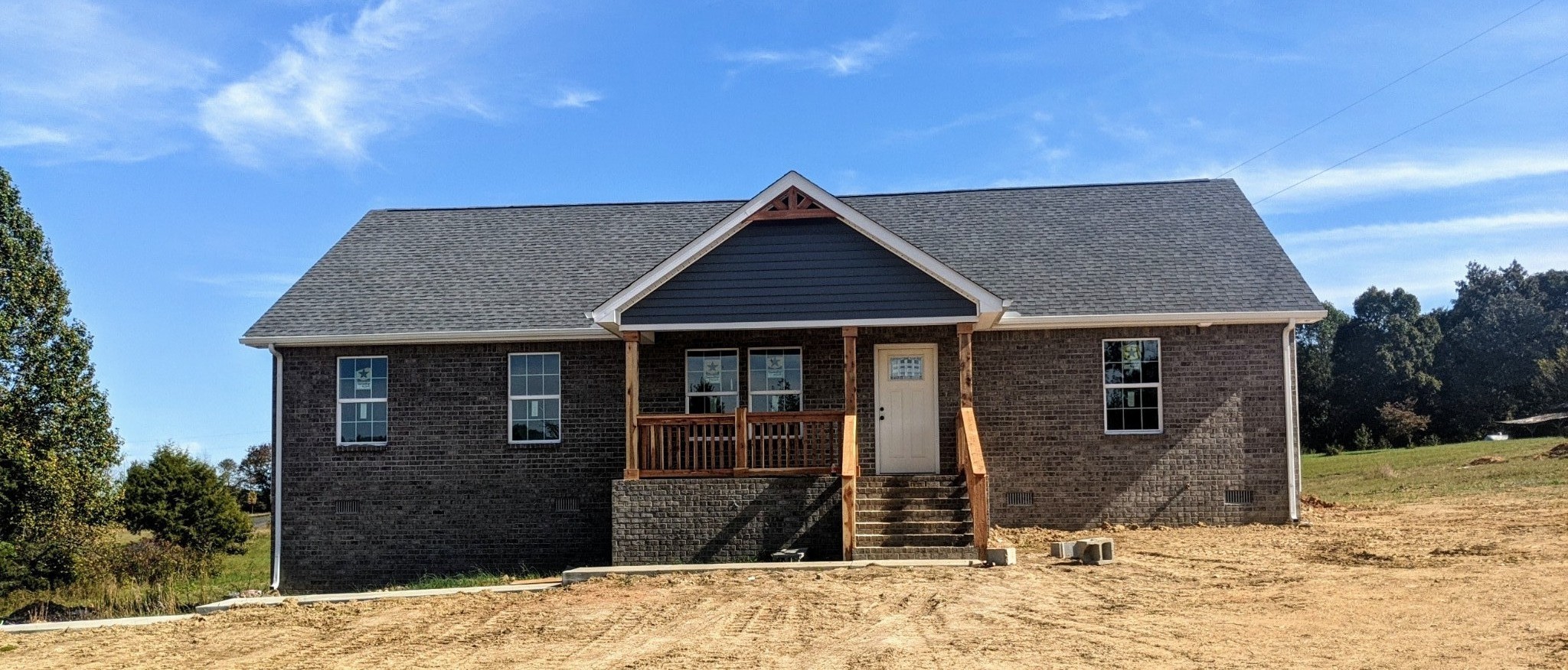 294 Claypool Road Bethpage, TN 37022 - Photo 1 of 3 a front view of a house with a yard