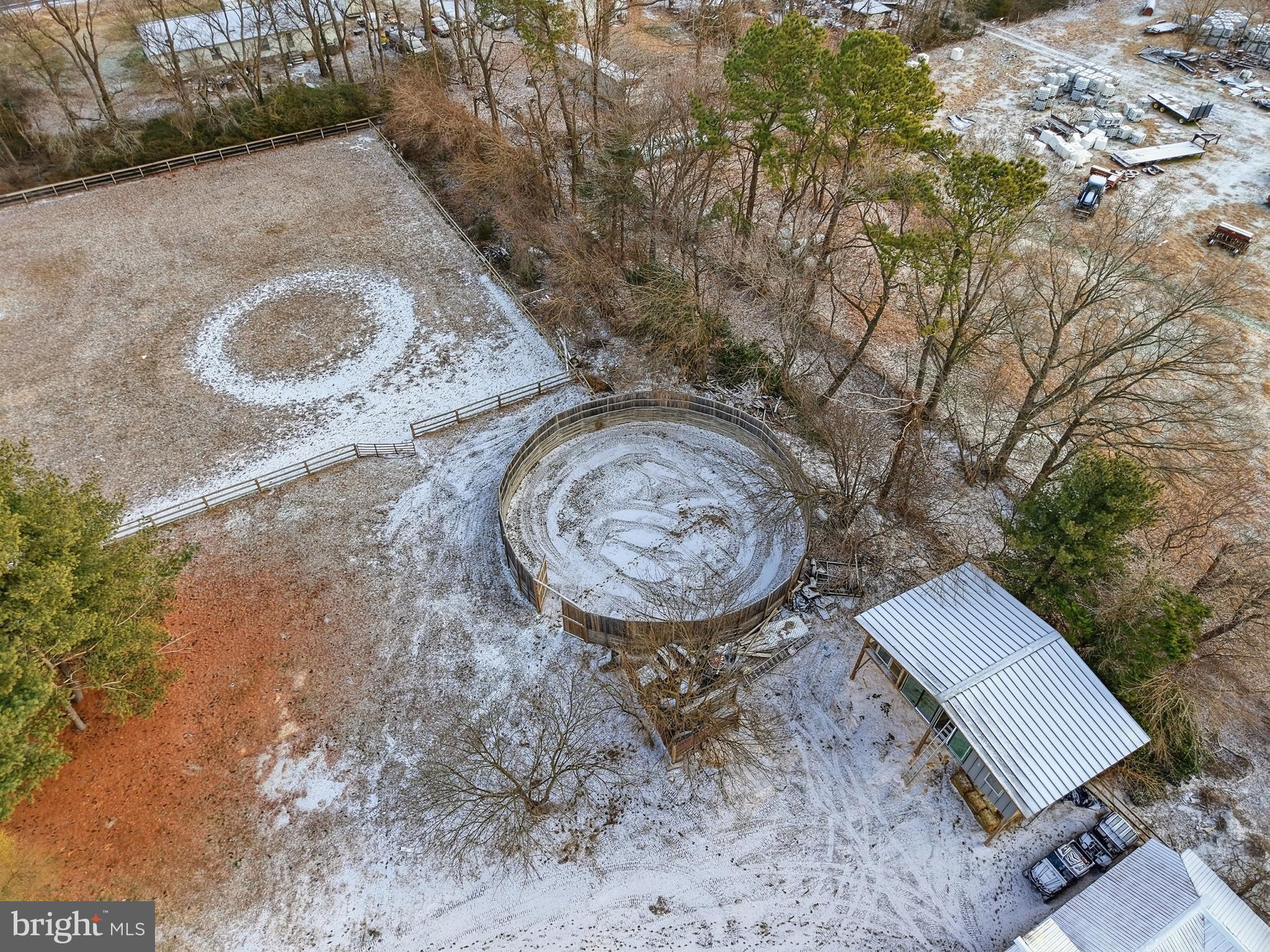 20915 Dover Bridge Road Preston, MD 21655 - Photo 22 of 60 a view of a backyard with a sink and a fire pit