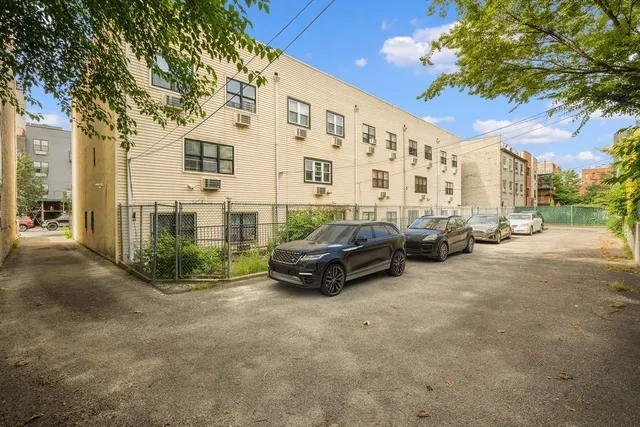 a car parked in front of a building