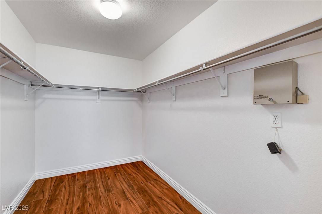 511 Rafkin Place Henderson, NV 89052 - Photo 35 of 64 Spacious closet featuring dark wood-style floors
