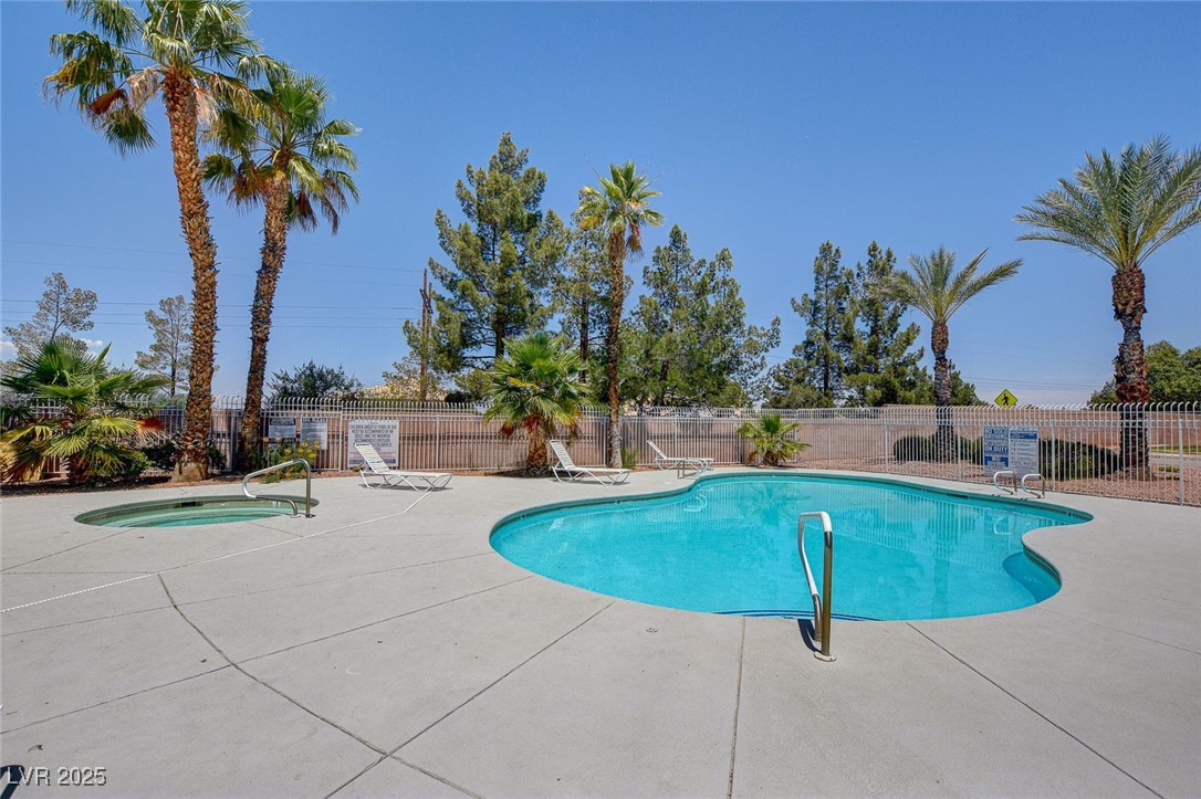 511 Rafkin Place Henderson, NV 89052 - Photo 55 of 64 Community pool with a patio area and a community hot tub