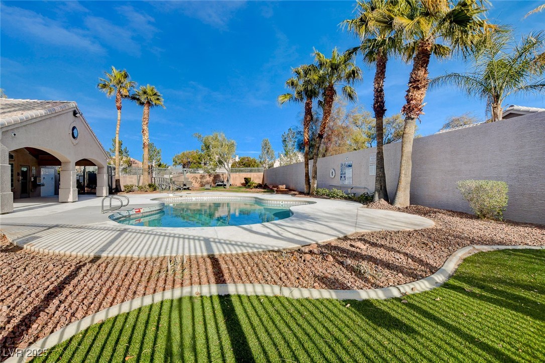 511 Rafkin Place Henderson, NV 89052 - Photo 59 of 64 View of swimming pool featuring a patio and a fenced backyard