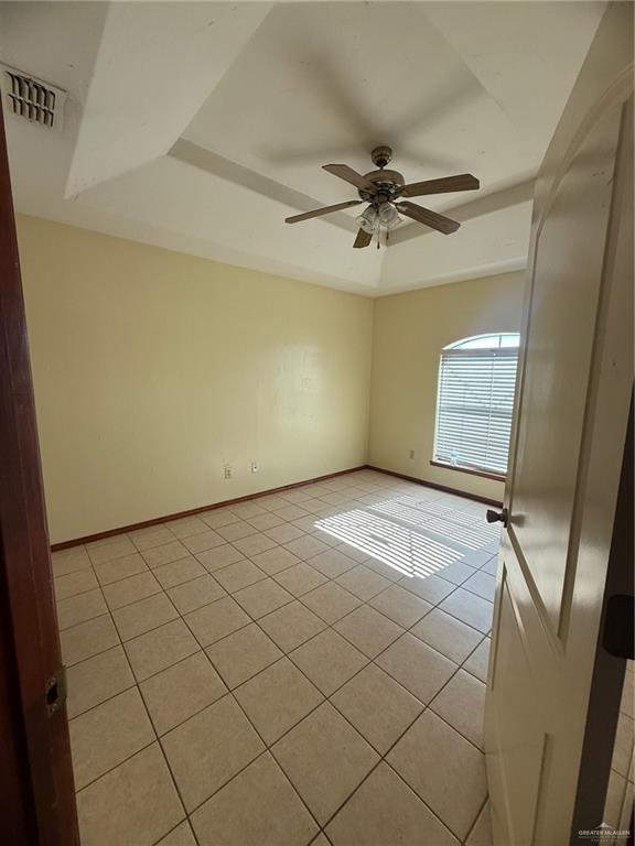 2000 Circle Drive, Unit 4 Mission, TX 78572 - Photo 9 of 18 a view of a livingroom with an empty space and a ceiling fan