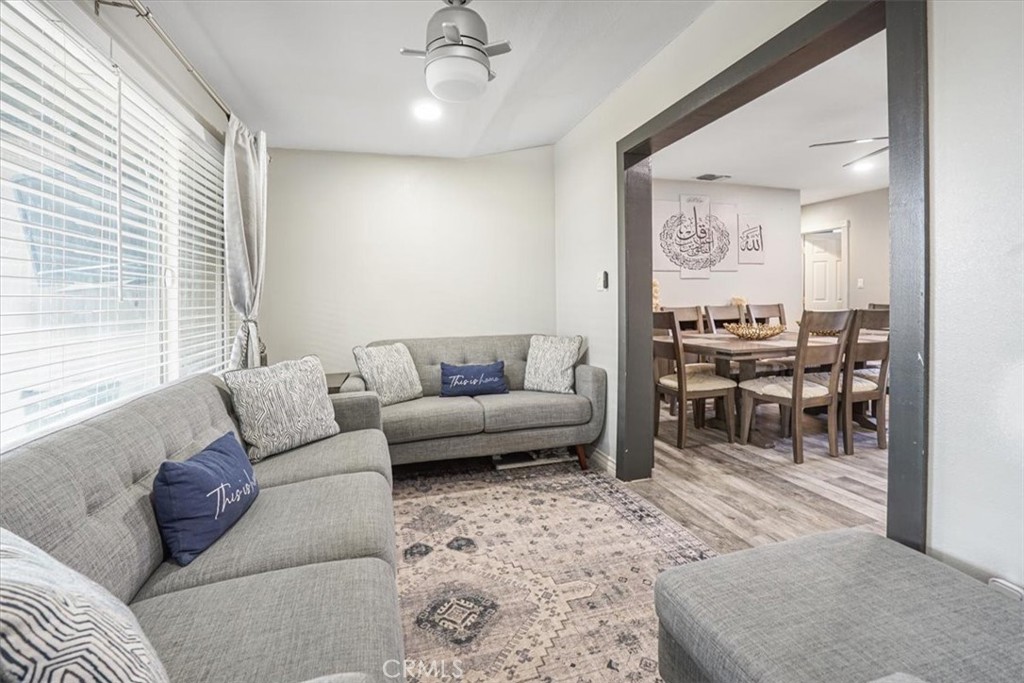 33962 Clark Lane Yucaipa, CA 92399 - Photo 16 of 48 a living room with furniture and wooden floor