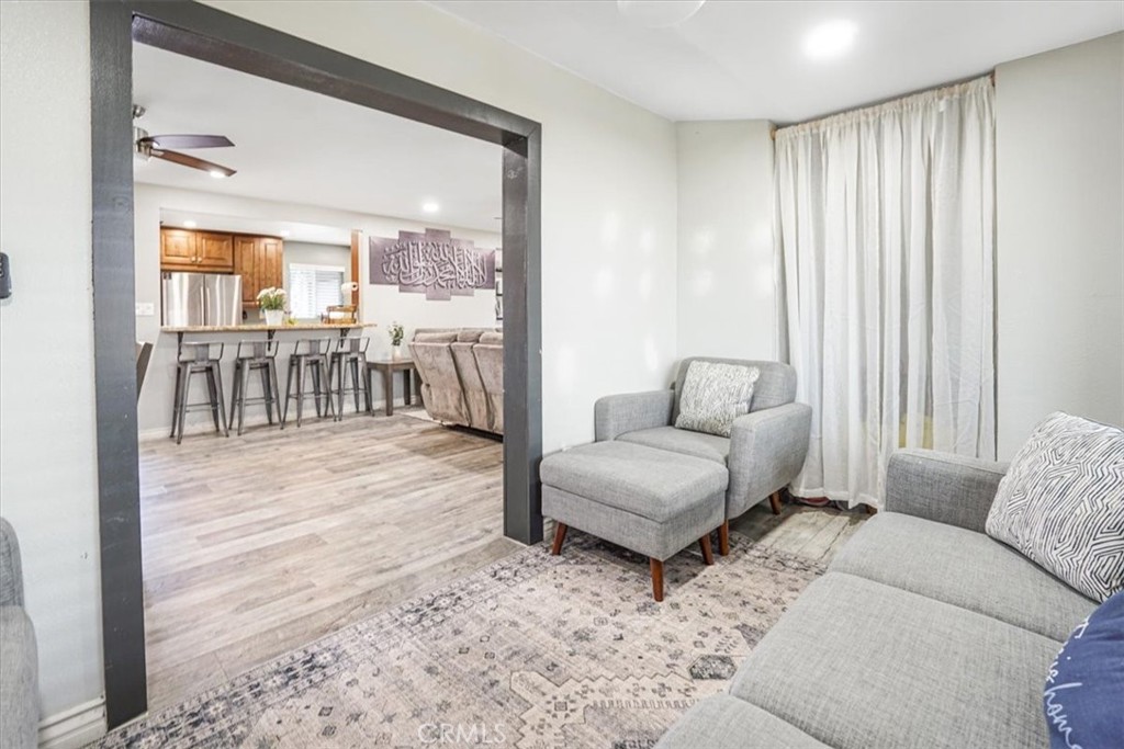 33962 Clark Lane Yucaipa, CA 92399 - Photo 18 of 48 a living room with furniture and a large window