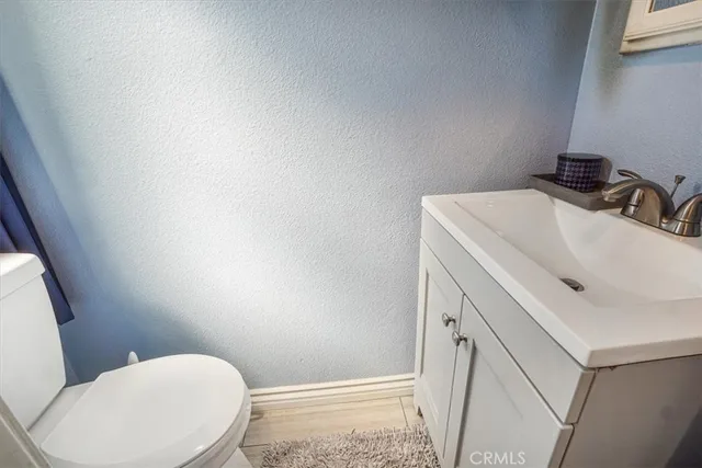 a bathroom with a sink and toilet