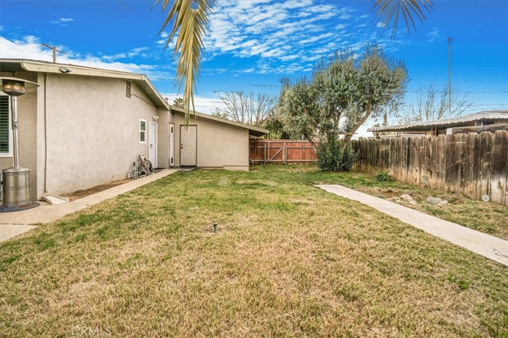 33962 Clark Lane Yucaipa, CA 92399 - Photo 37 of 48 a view of a house with a yard