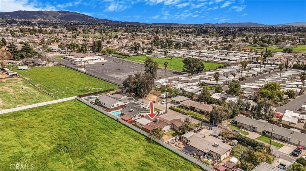 33962 Clark Lane Yucaipa, CA 92399 - Photo 42 of 48 an aerial view of residential houses with outdoor space and trees