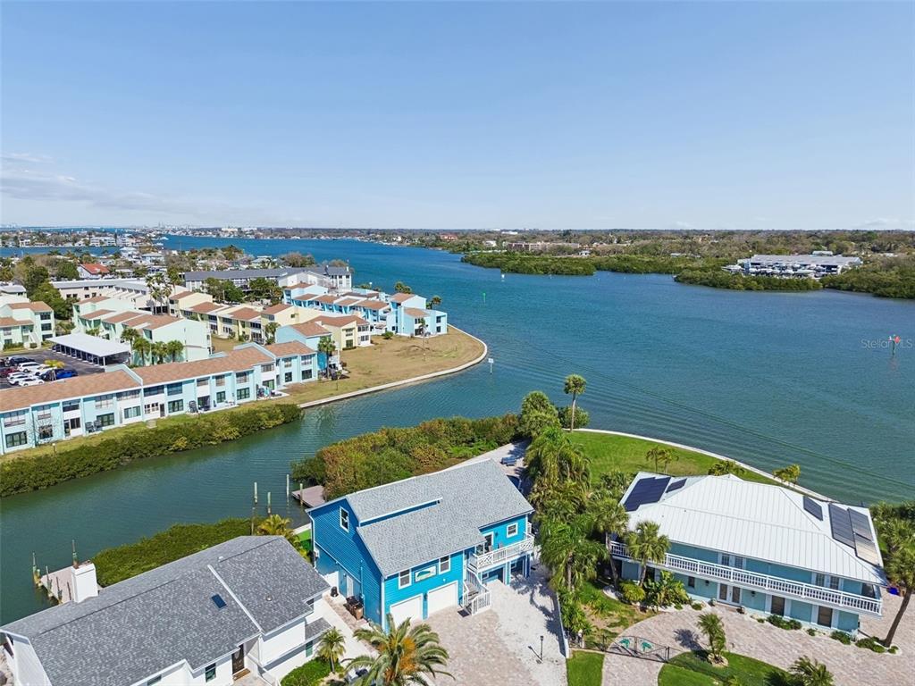 330 6th Avenue Indian Rocks Beach, FL 33785 - Photo 3 of 52 an aerial view of a house with a lake view