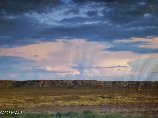 a view of an outdoor space and a mountain view