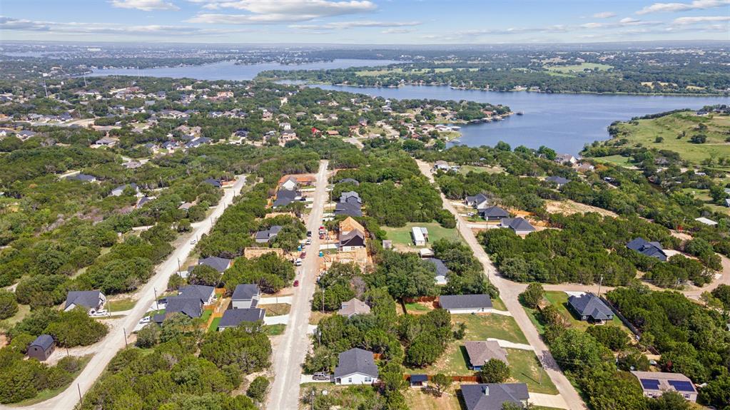 5734 Black Pine Circle Granbury, TX 76048 - Photo 1 of 1 an aerial view of residential building with outdoor space