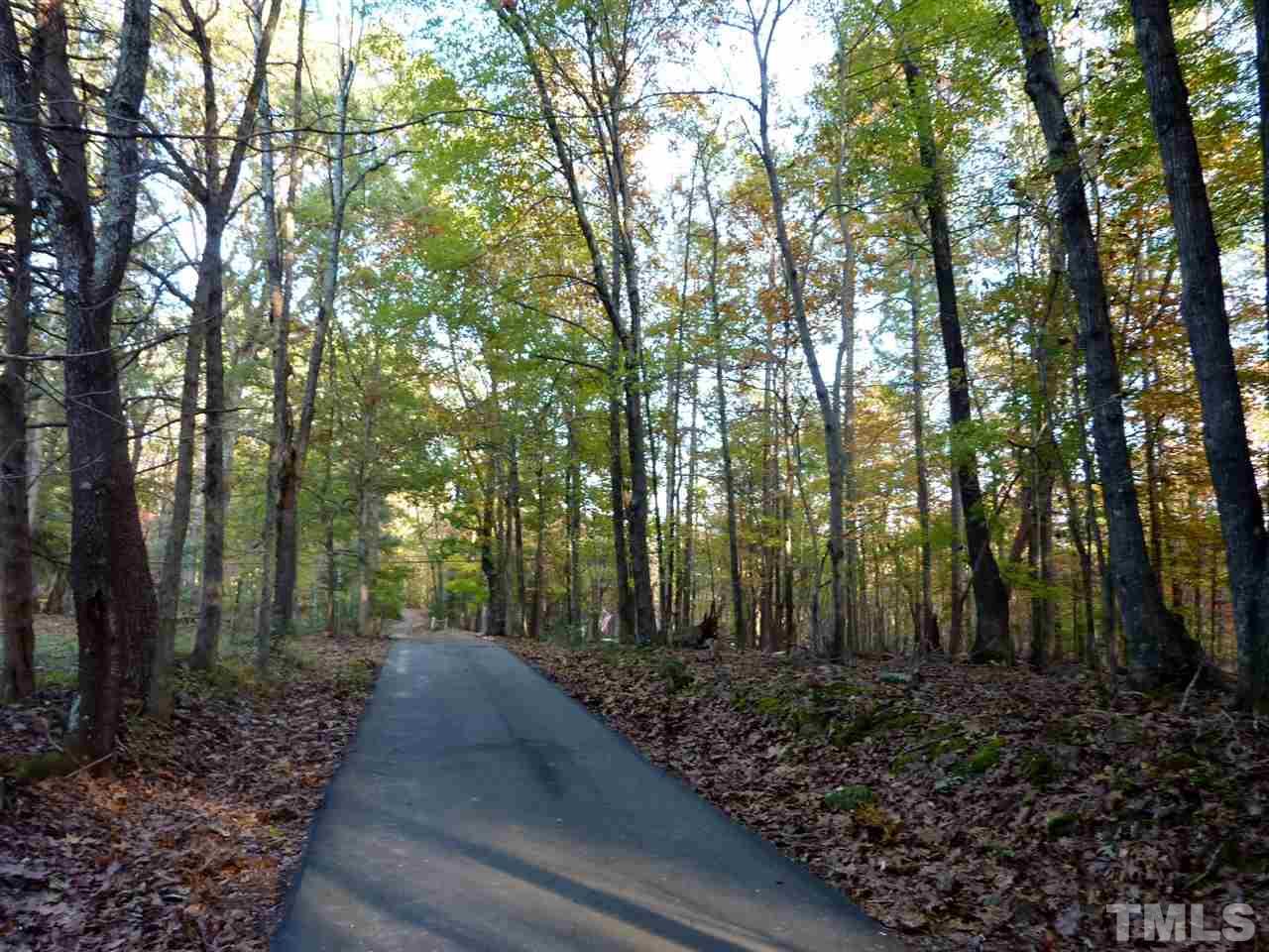 1519 Pleasant Green Road Durham, NC 27705 - Photo 2 of 30 Lots of trees, opens up to the house view