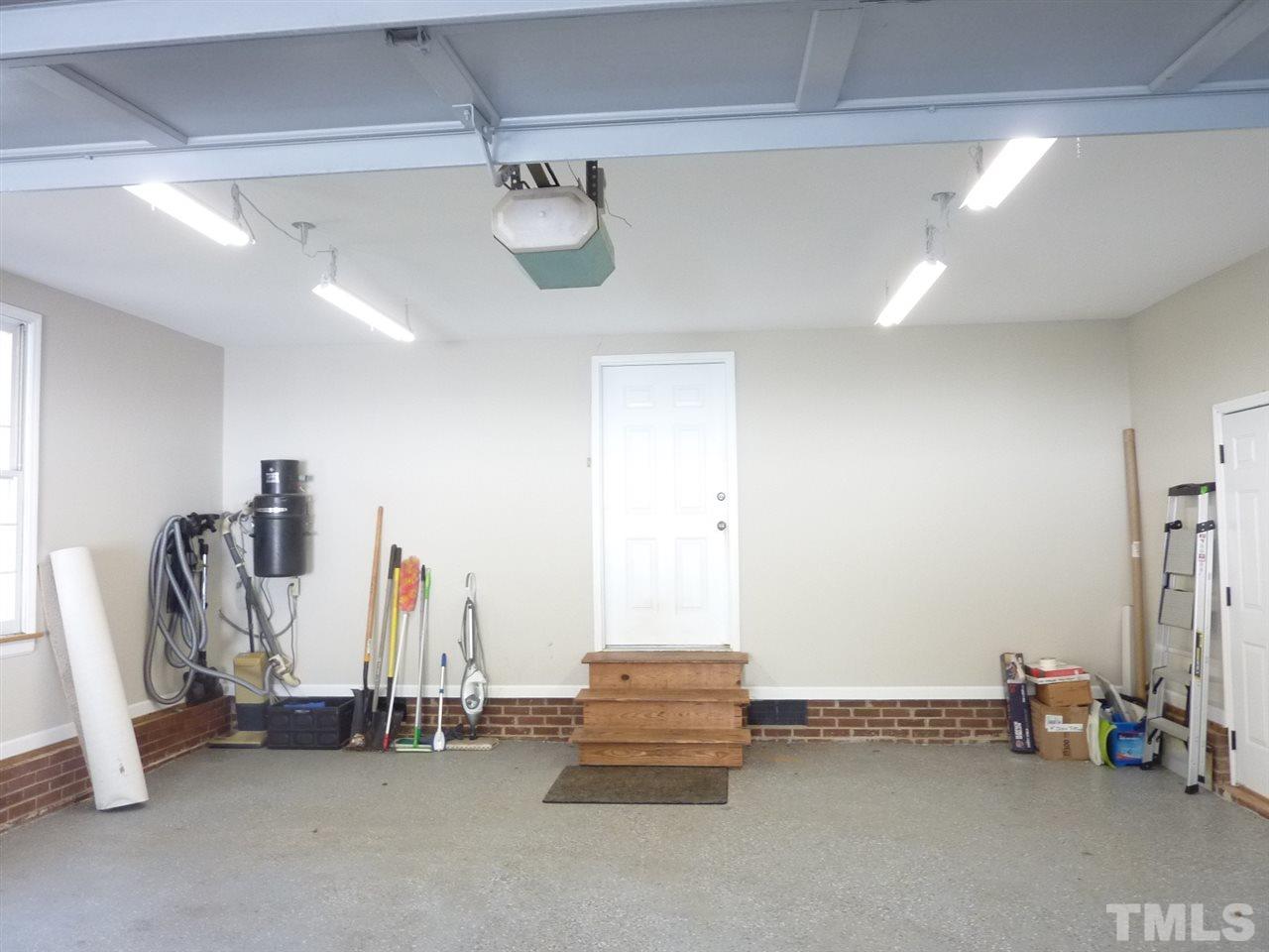 1519 Pleasant Green Road Durham, NC 27705 - Photo 26 of 30 Attached with door to kitchen, laundry area. Painted floor. New lighting.