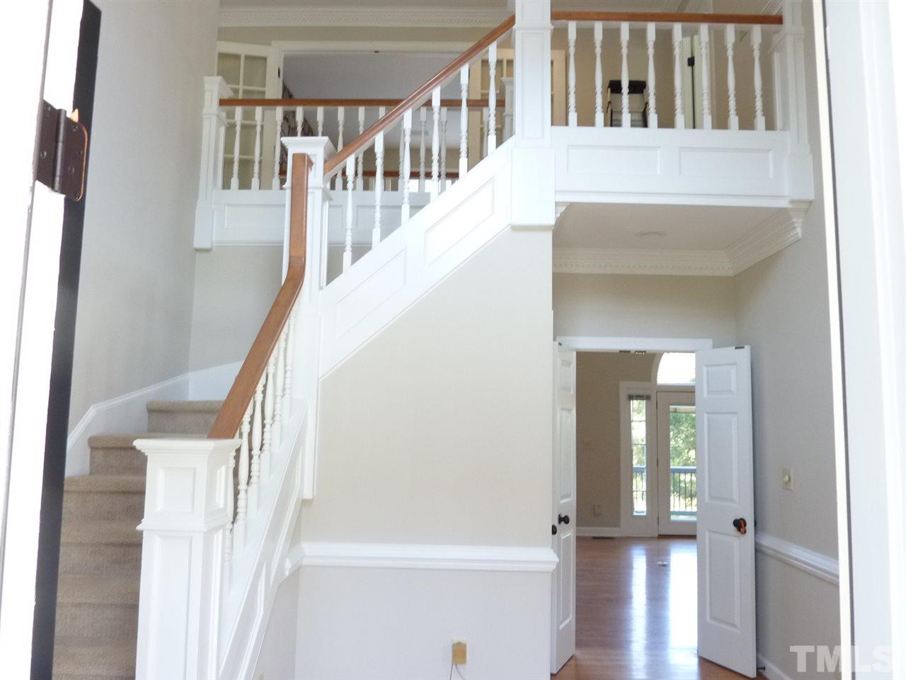 1519 Pleasant Green Road Durham, NC 27705 - Photo 7 of 30 doors on either side to Dining and Music Room, privacy doors to Great room straight ahead. Beautiful moldings through out.