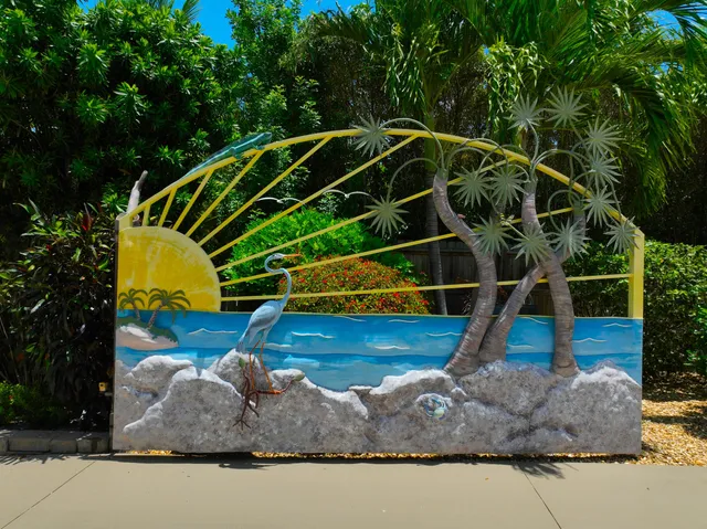 a view of a wooden deck with a backyard