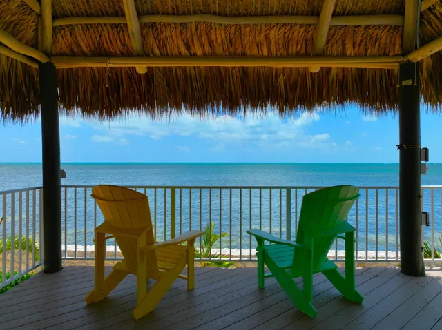 a view of two chairs in patio