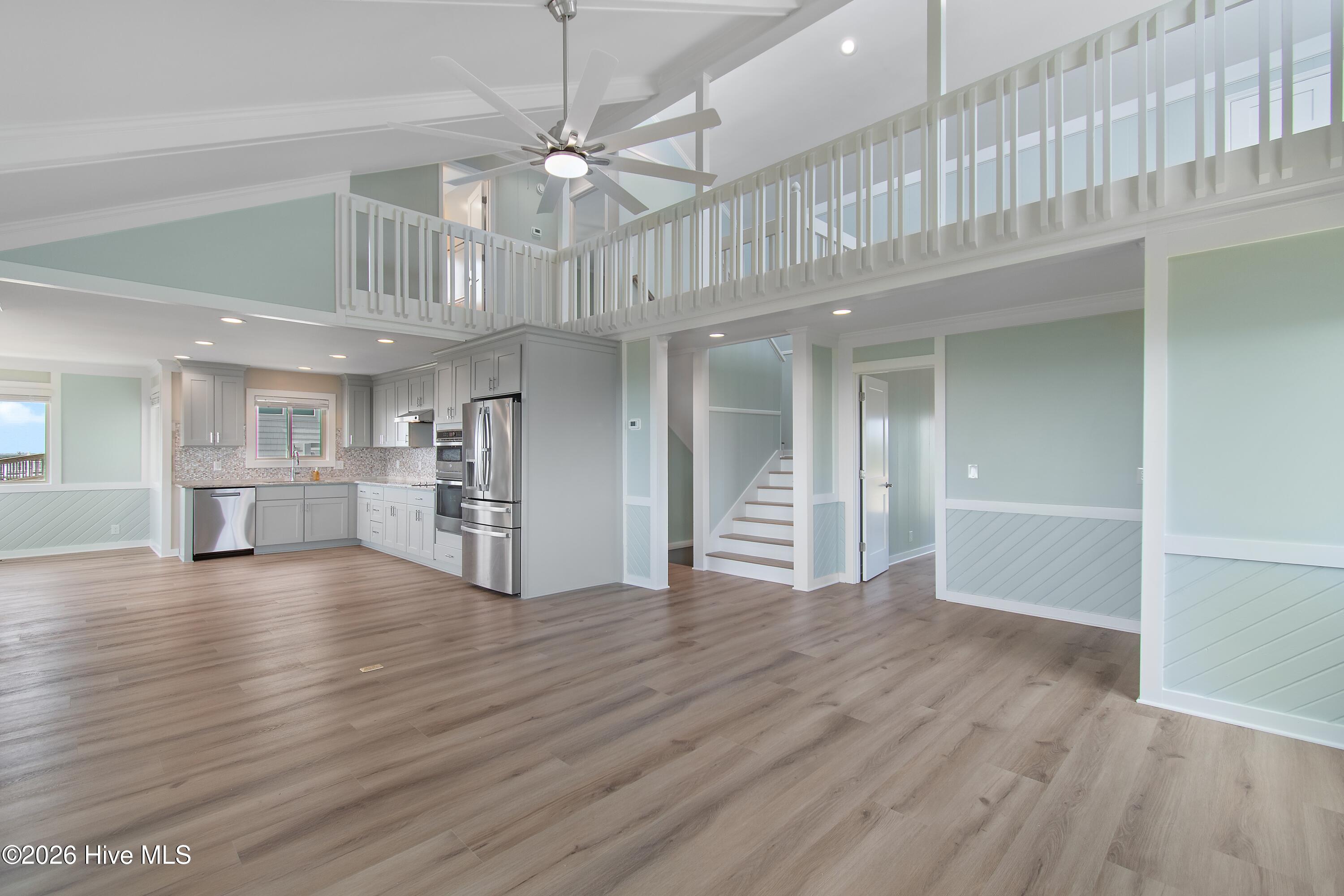645 Caswell Beach Road Oak Island, NC 28465 - Photo 11 of 77 Living Area and Loft
