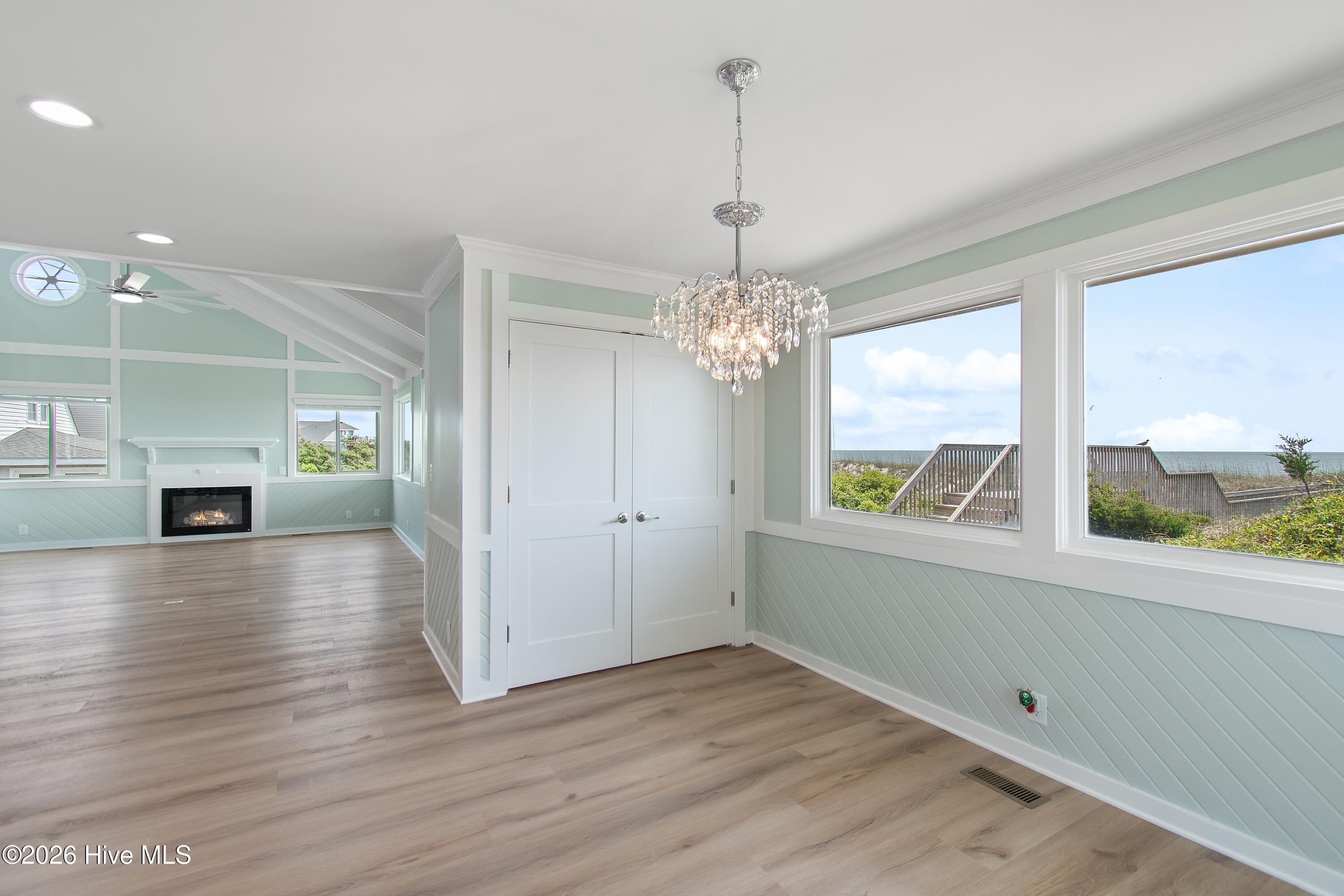 645 Caswell Beach Road Oak Island, NC 28465 - Photo 19 of 77 Dining Room and Living Room