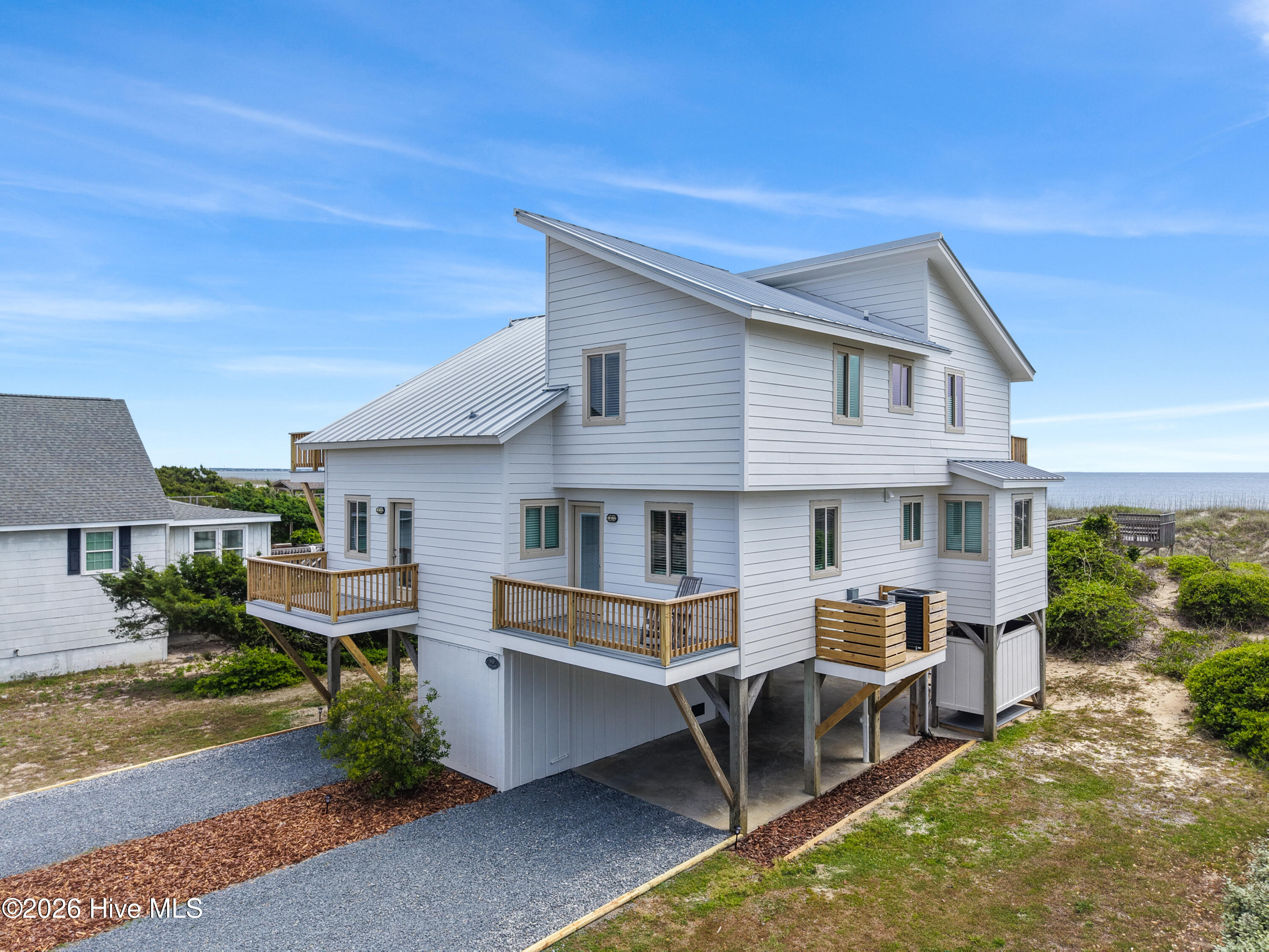 645 Caswell Beach Road Oak Island, NC 28465 - Photo 2 of 77 645CaswellBeachRd - 22