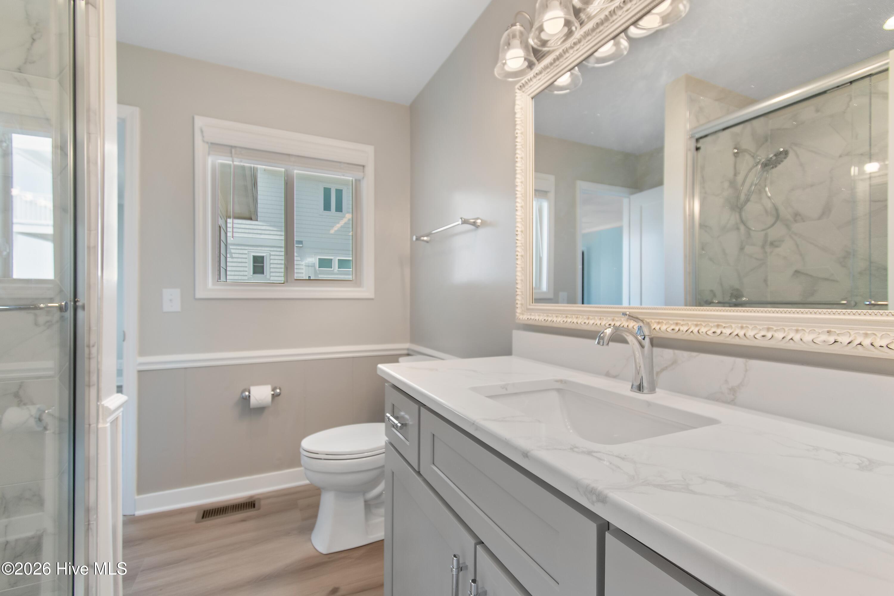 645 Caswell Beach Road Oak Island, NC 28465 - Photo 26 of 77 Jack and Jill Bath First Floor