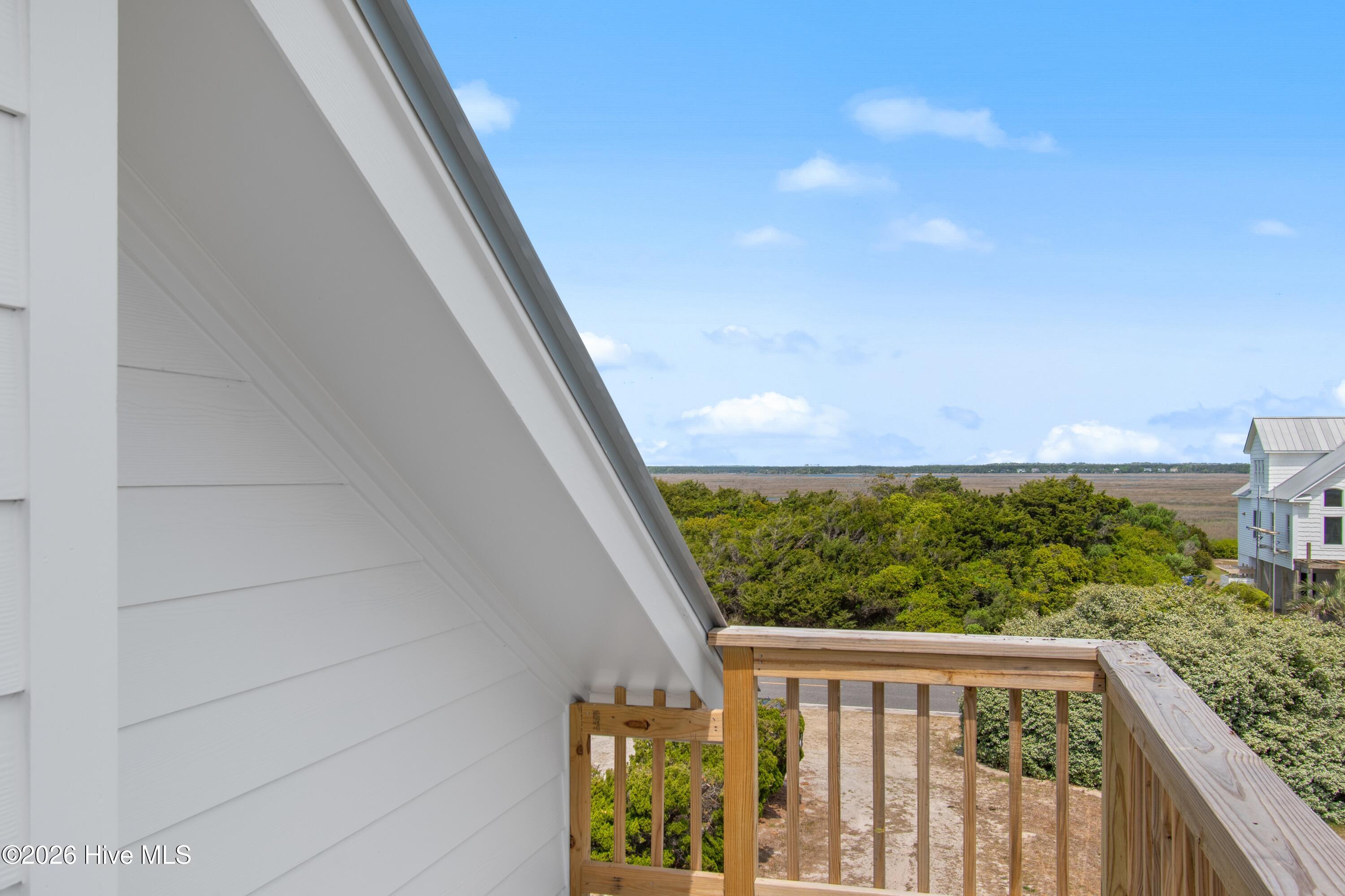 645 Caswell Beach Road Oak Island, NC 28465 - Photo 38 of 77 Second FloorSide Deck ICW Marsh View