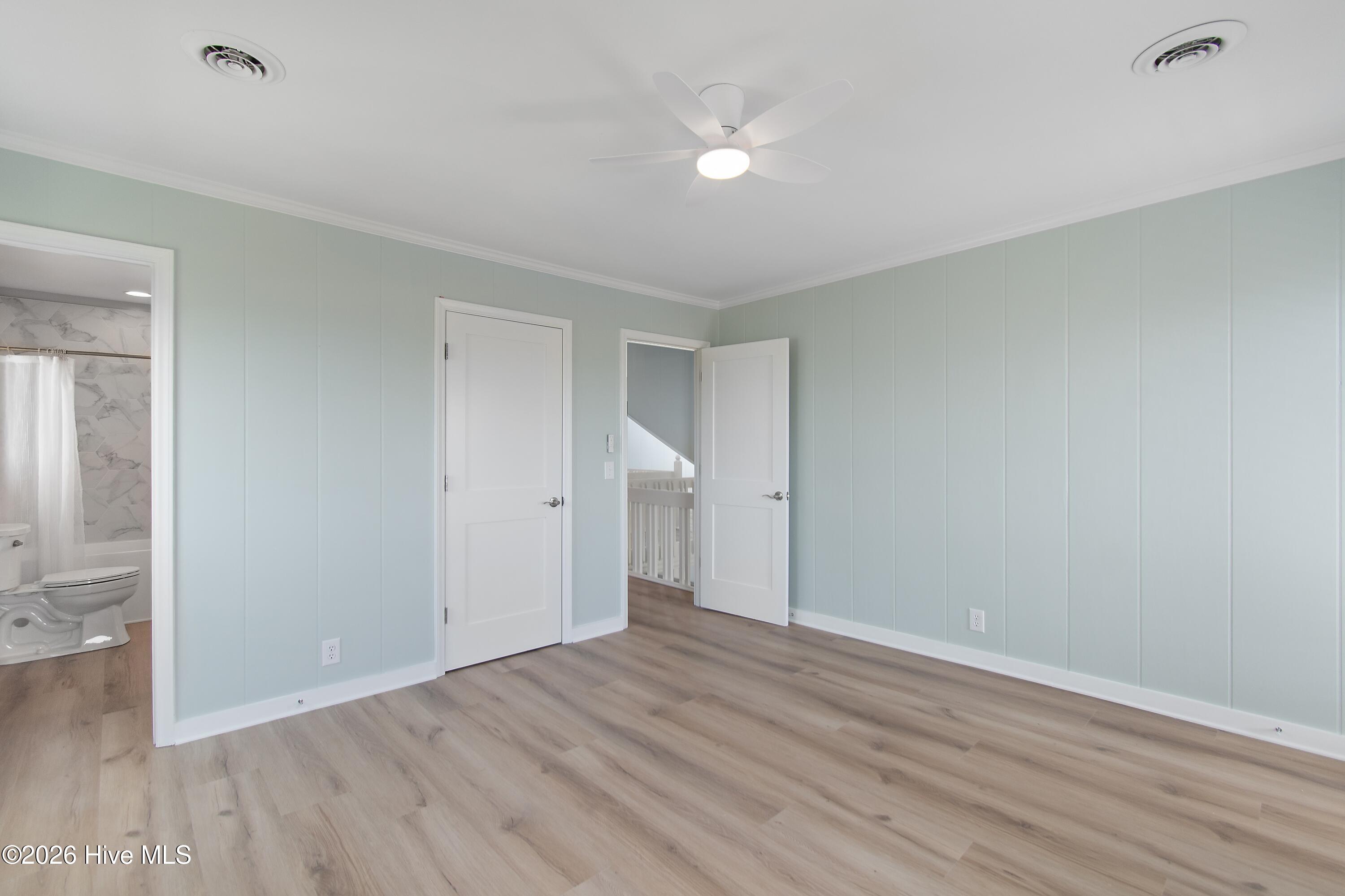 645 Caswell Beach Road Oak Island, NC 28465 - Photo 45 of 77 Primary Bedroom