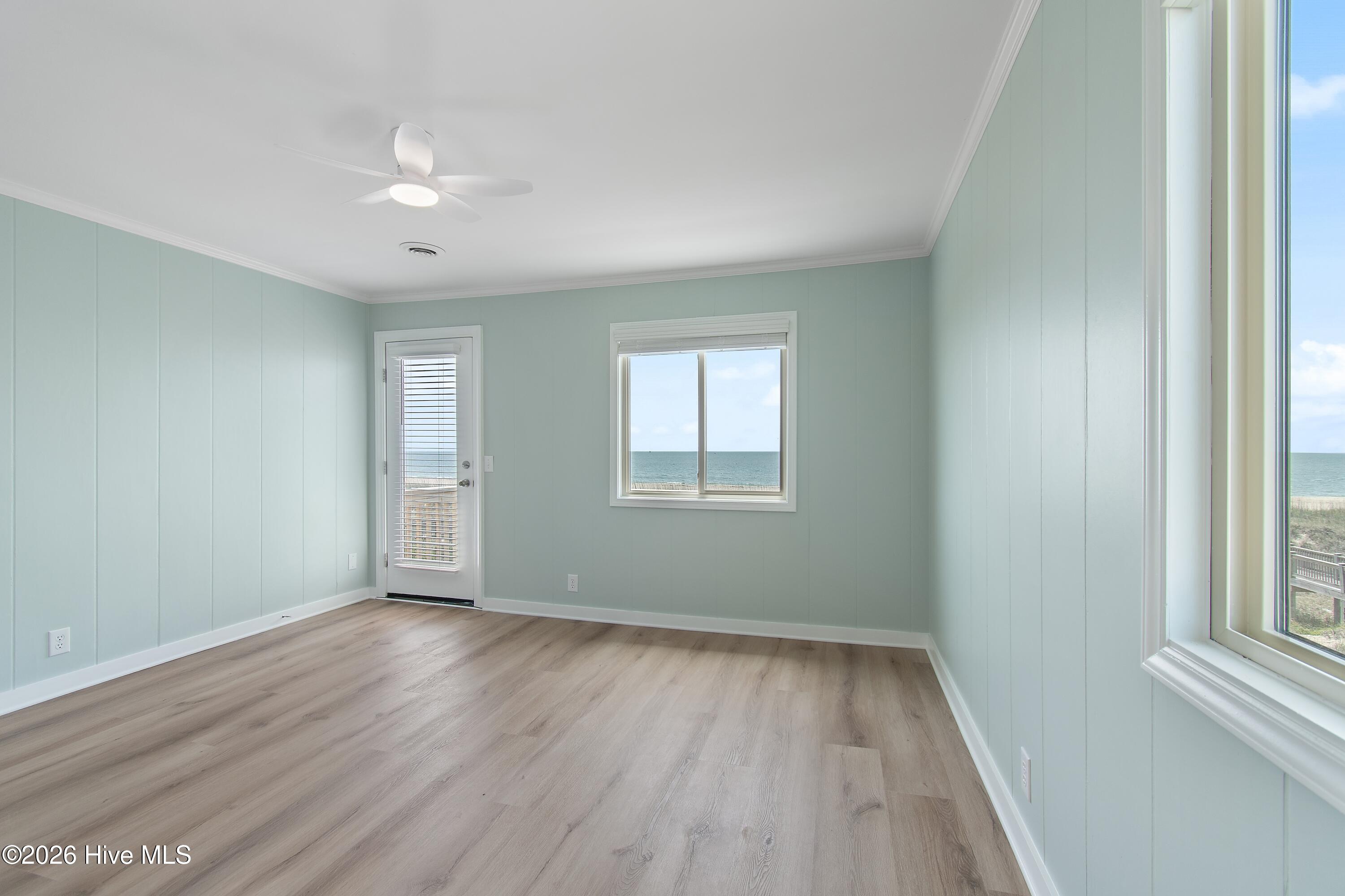 645 Caswell Beach Road Oak Island, NC 28465 - Photo 46 of 77 Primary Bedroom