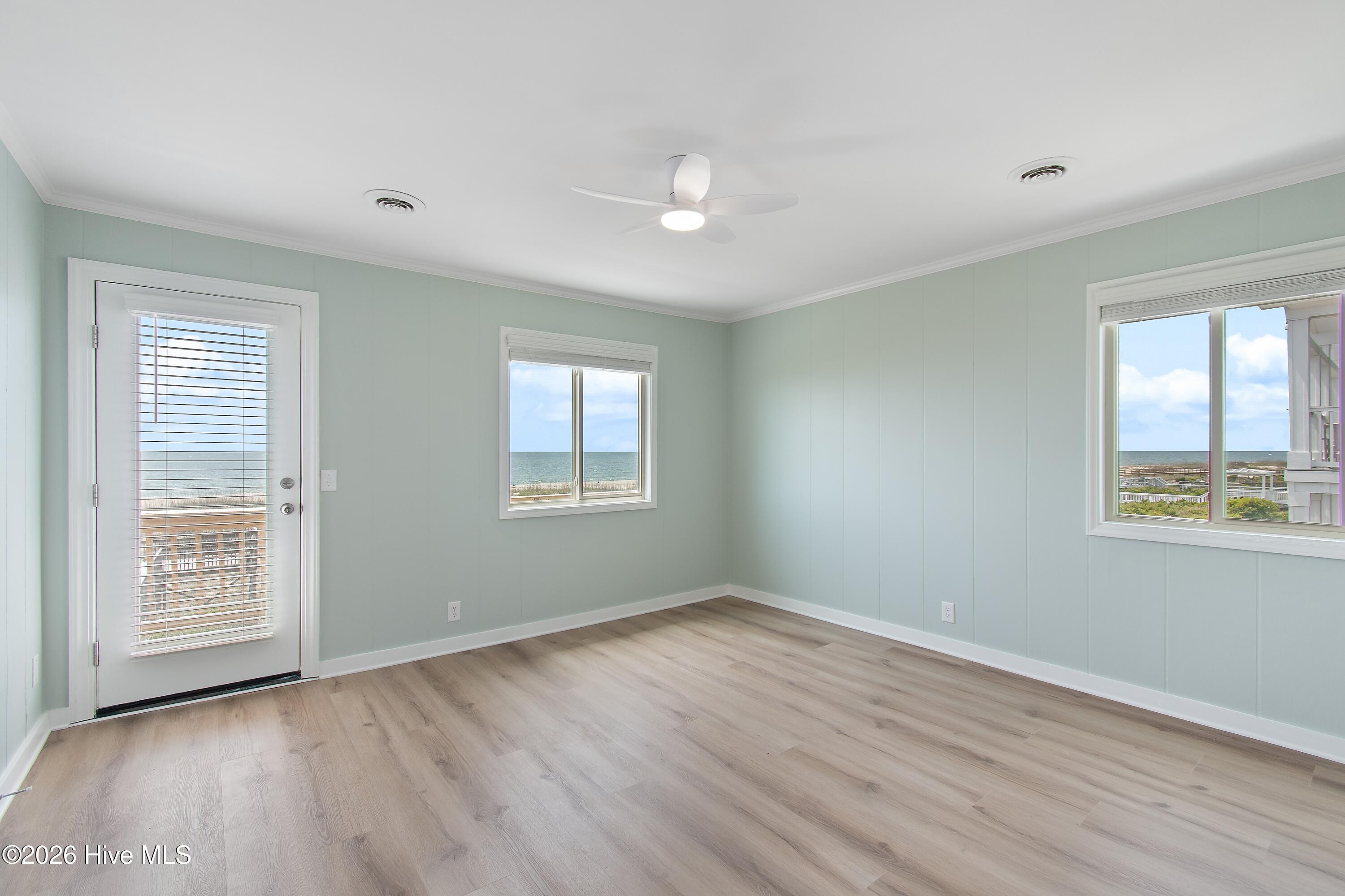 645 Caswell Beach Road Oak Island, NC 28465 - Photo 47 of 77 Primary Bedroom