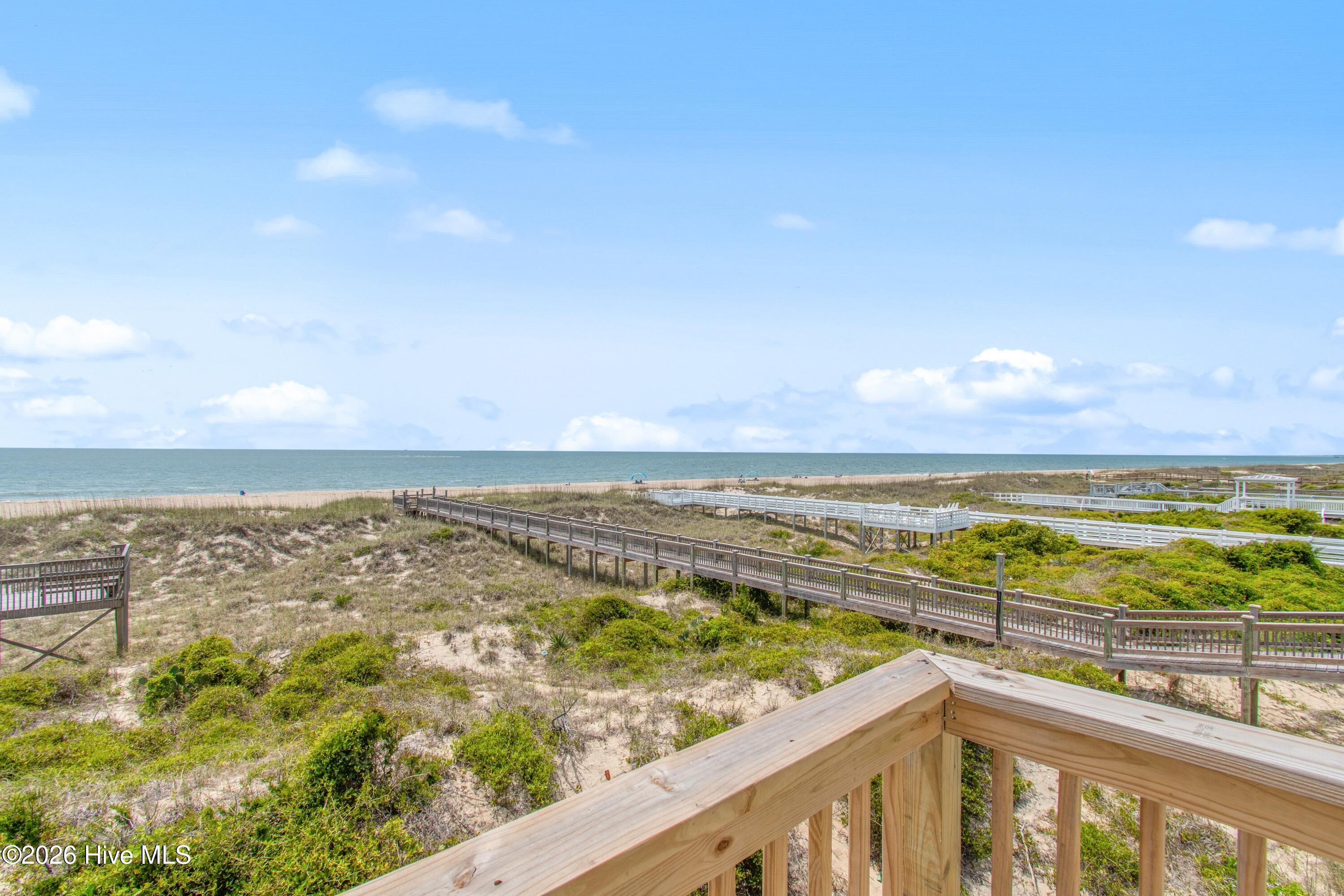 645 Caswell Beach Road Oak Island, NC 28465 - Photo 50 of 77 Primary Deck Ocean View Towards Oak Island and Holden Beach