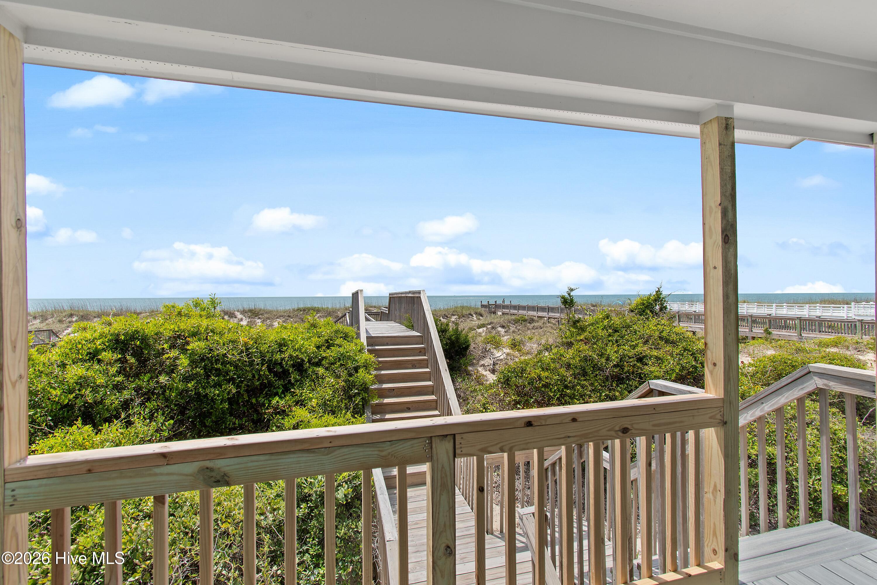 645 Caswell Beach Road Oak Island, NC 28465 - Photo 51 of 77 Porch View to Ocean