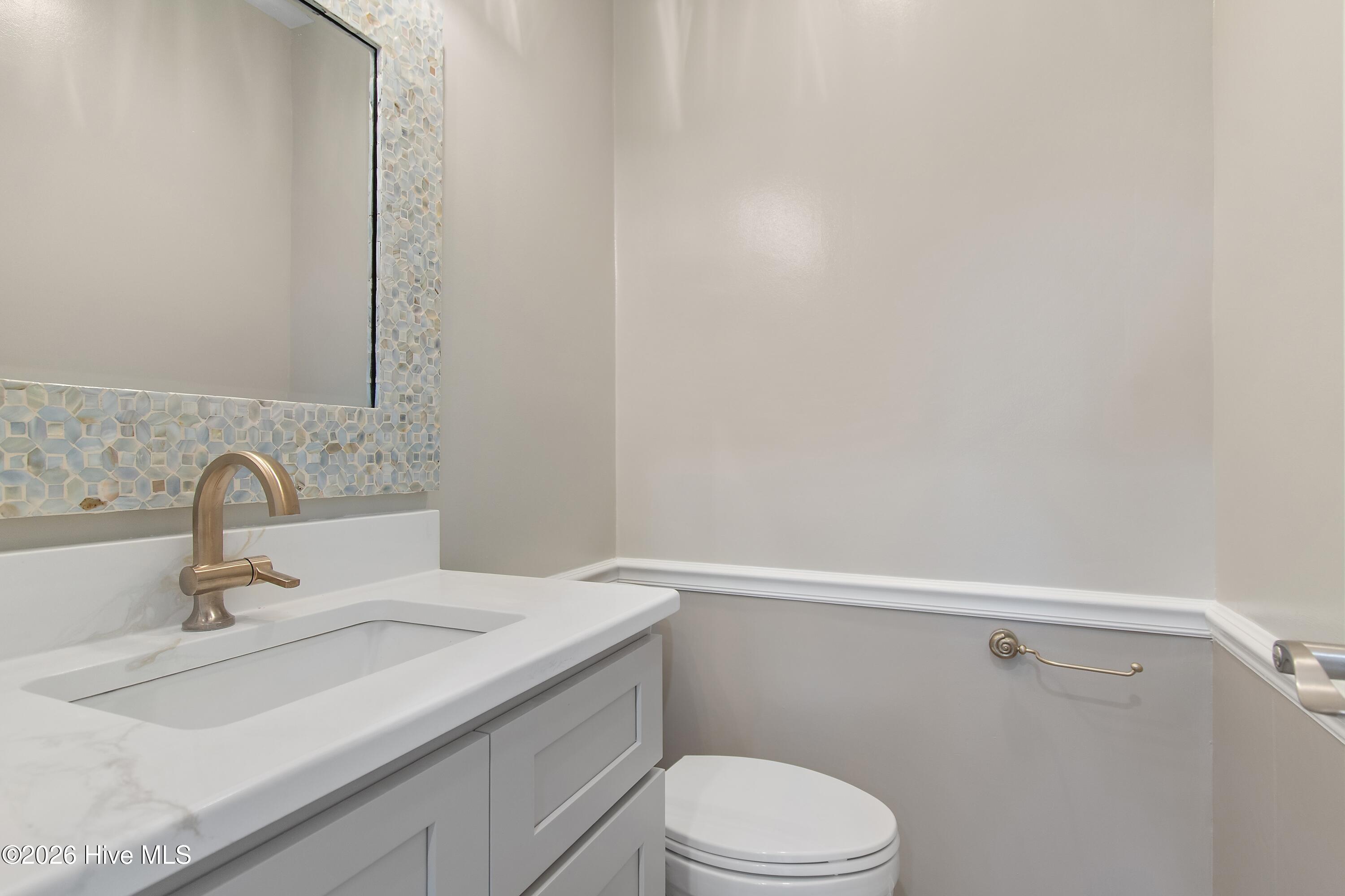 645 Caswell Beach Road Oak Island, NC 28465 - Photo 61 of 77 Half Bath