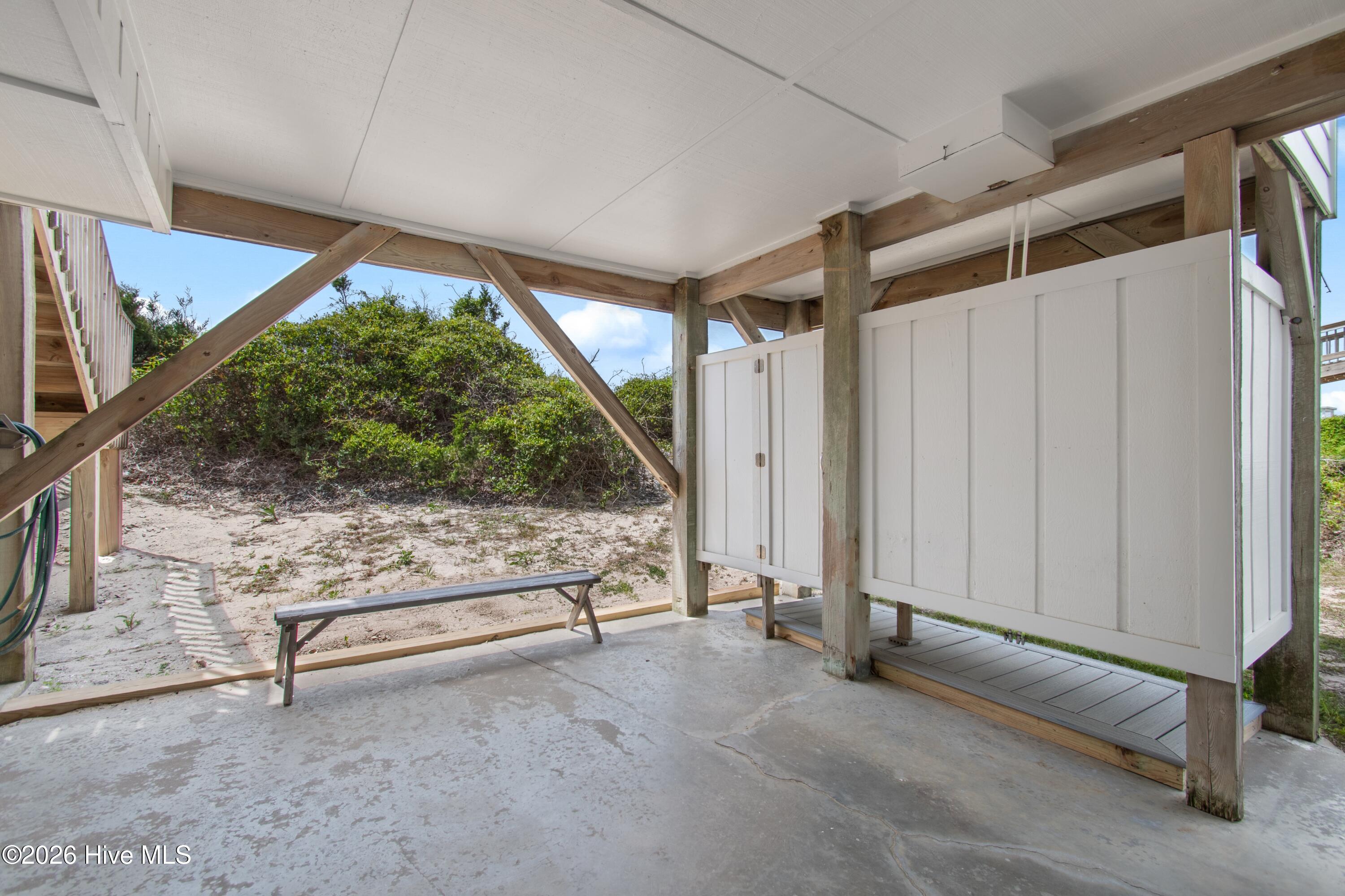645 Caswell Beach Road Oak Island, NC 28465 - Photo 64 of 77 Outdoor Shower