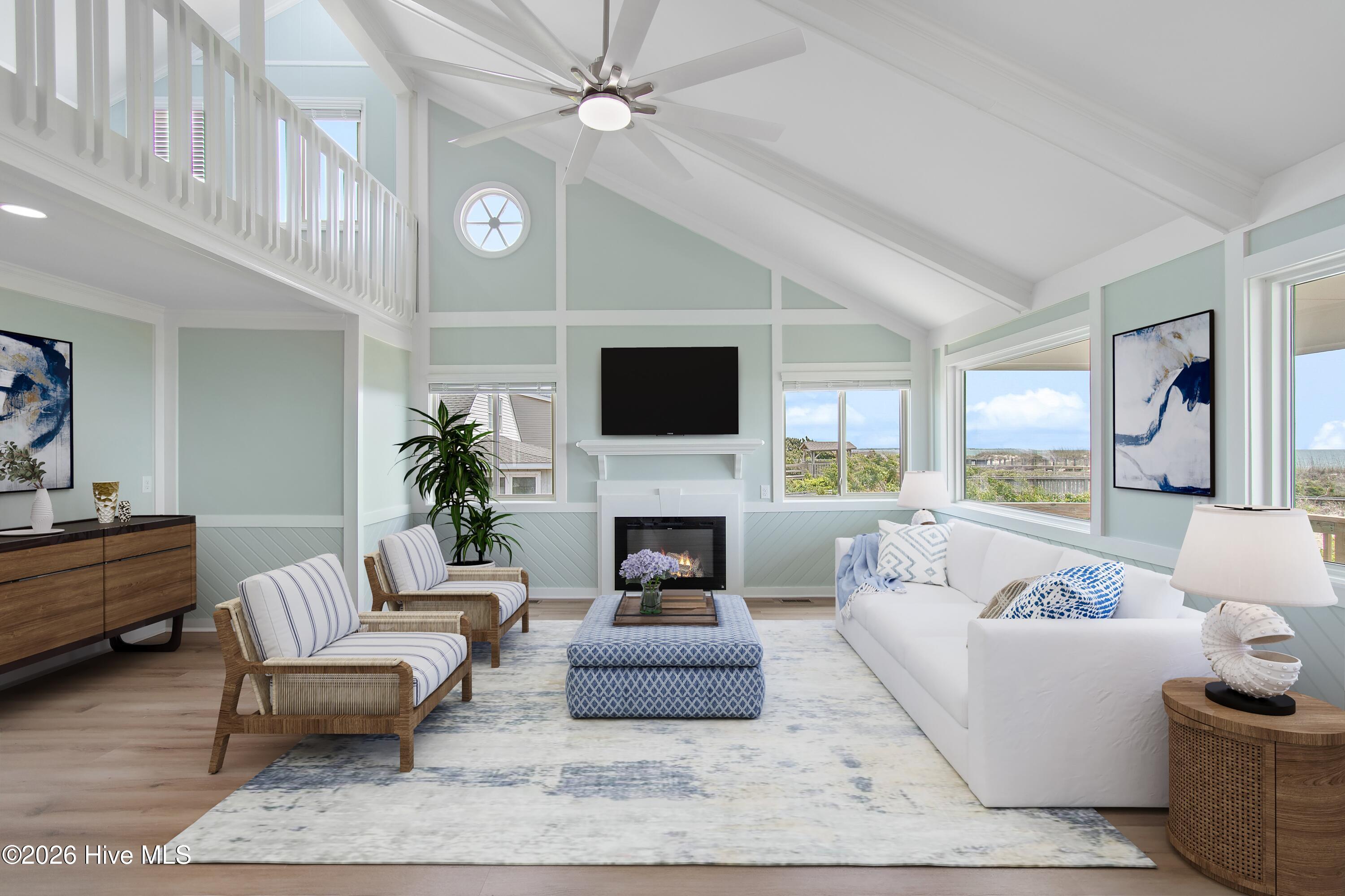645 Caswell Beach Road Oak Island, NC 28465 - Photo 10 of 77 This photo has been virtually staged to show how the room could look furnished.