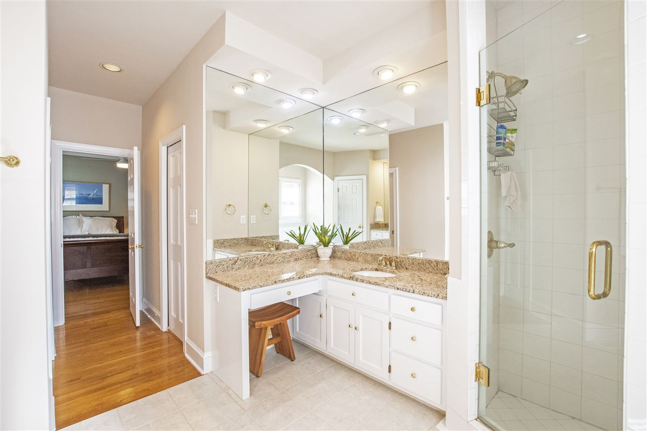 5817 Laurel Rock Lane Raleigh, NC 27613 - Photo 14 of 30 Huge master bath has two walk in closets, soaking/garden tub, tiled shower, separate WC, and two separate vanities! No more fighting for space! Master Bath