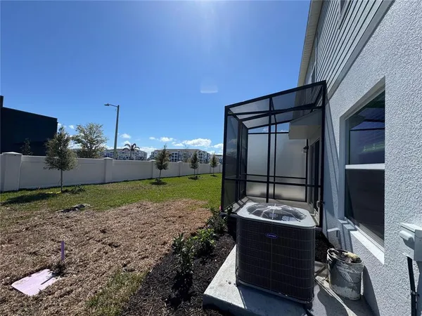a view of a backyard of the house